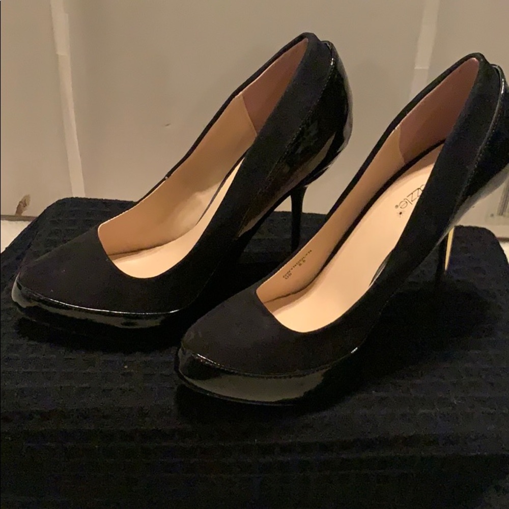 Black pumps with gold heel. Size 8